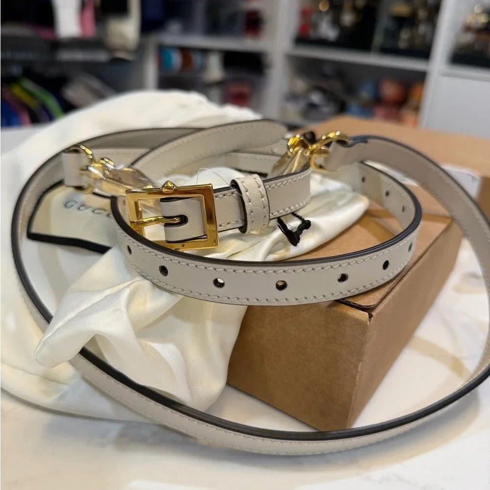 Gucci White leather straps with gold accent - NEW